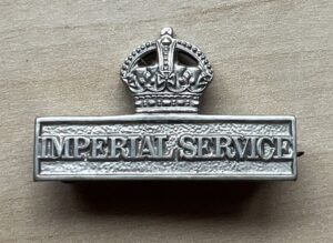 The Imperial Service Badge worn by officers and men of the Territorial Force who signed the Imperial Service Obligation, volunteering to serve overseas if called to do so.