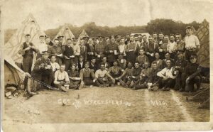 Men of C Company 2/8th Worcestershire at Epping, enjoing tea and tinned pineapples