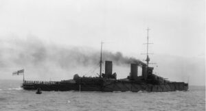 H.M.S. Queen Mary The crew cheering the King while passing the Royal Yacht in July 1914.
